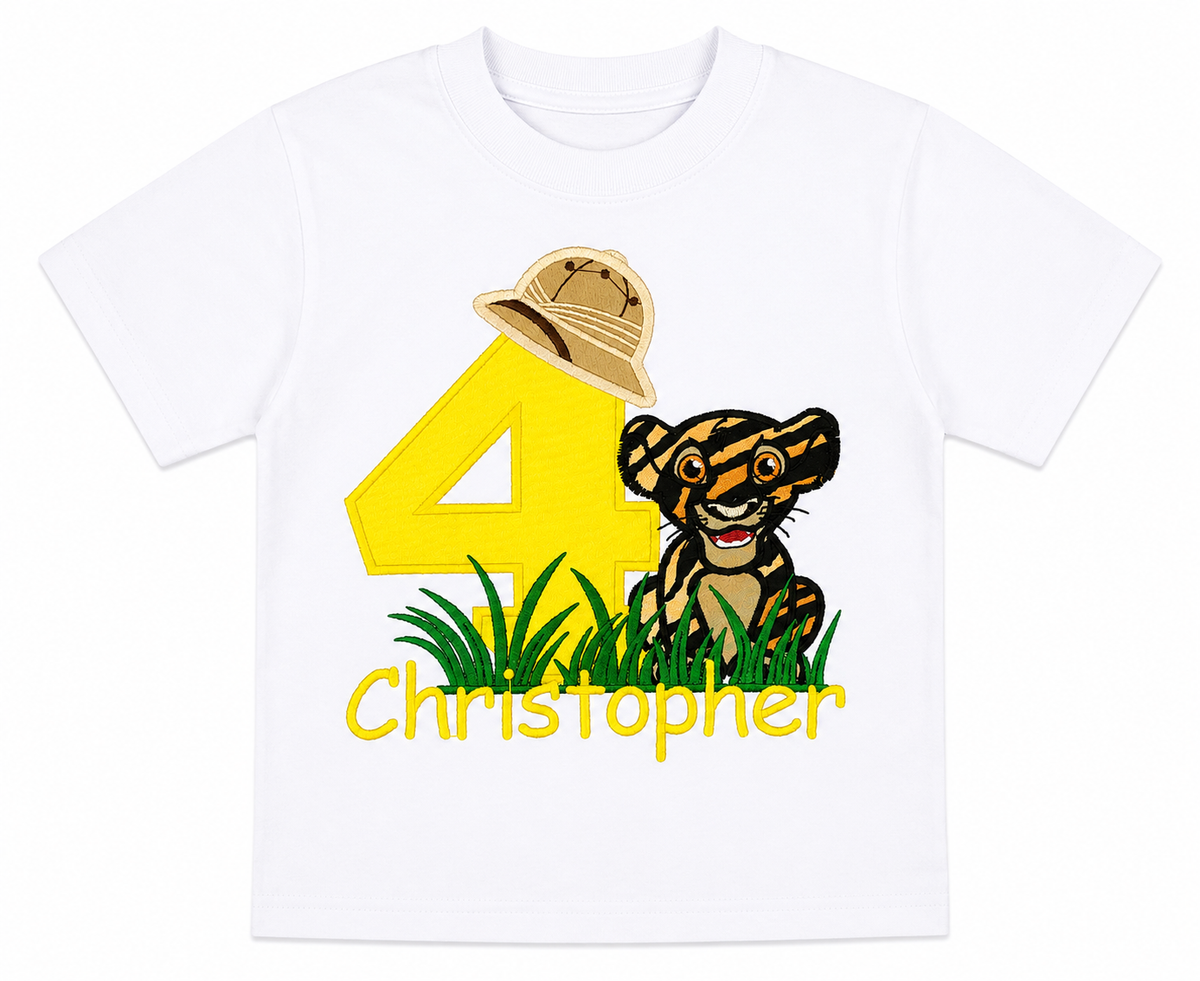 Lay-flat view of a personalized embroidered safari birthday shirt featuring a yellow number 4, adorable tiger cub, safari explorer hat, and custom embroidered name Christopher on a white 100% cotton shirt. | RoJo Custom Designs